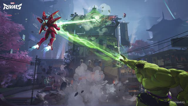 <p>Marvel</p> Iron Man and Hulk in the Tokyo battlefield of 'Marvel Rivals'