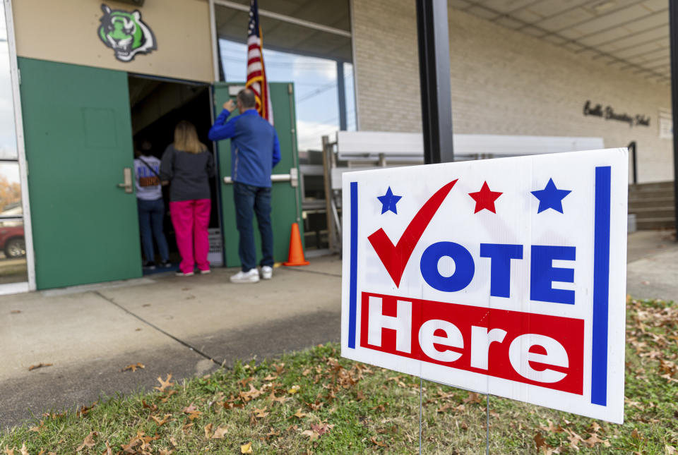 Voters arrive to cast their ballots on Election Day at Crabbe Elementary School Tuesday, Nov. 7, 2023, in Ashland, Ky. (Sholten Singer/The Herald-Dispatch via AP)