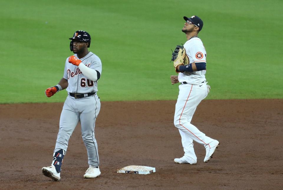 Detroit Tigers center fielder Akil Baddoo (60) reacts to his RBI double in the second inning April 14, 2021, at Minute Maid Park.