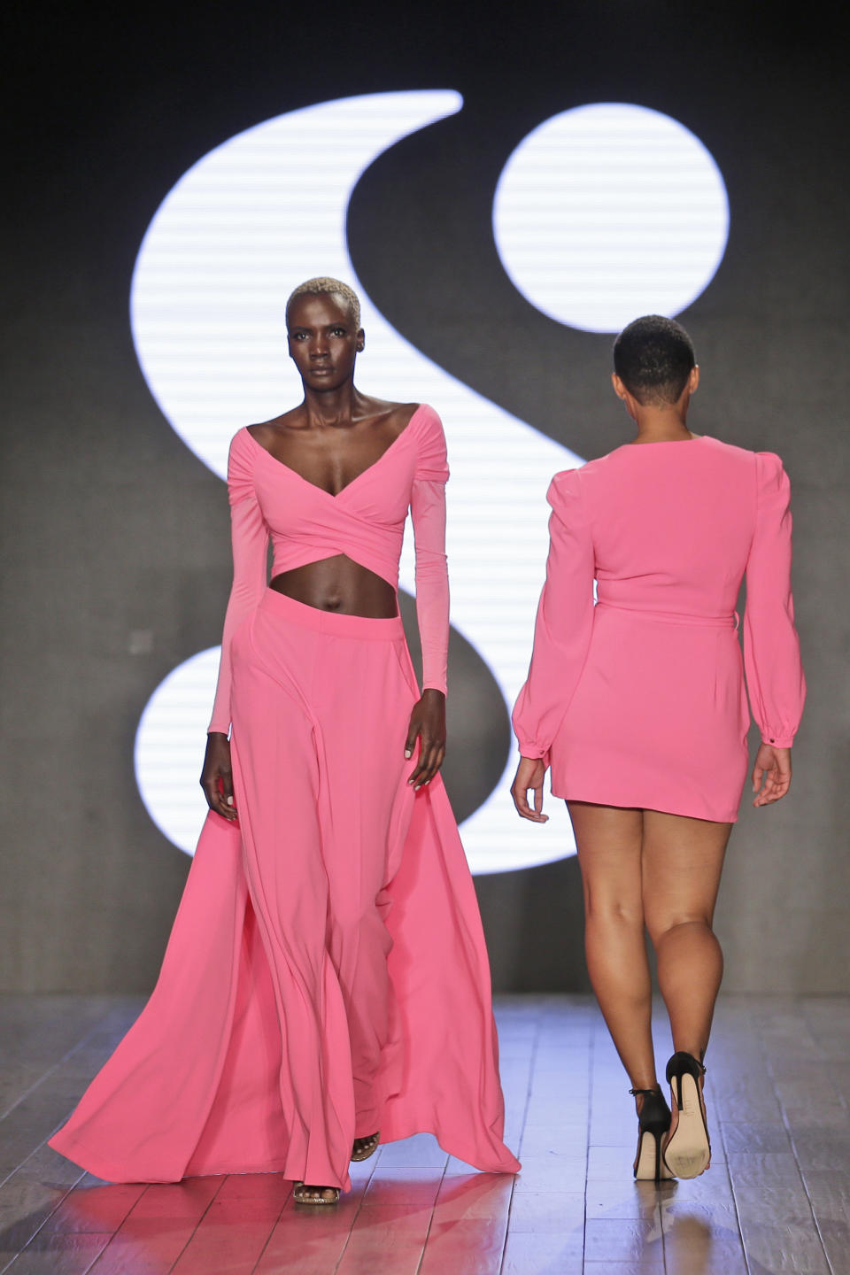 Modesl wear clothes by Serena Williams during Fashion Week in New York, Tuesday, Sept. 10, 2019. (AP Photo/Seth Wenig)