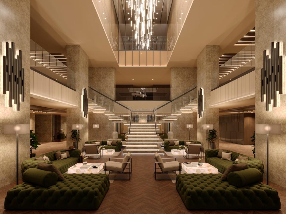 A rendering of a two-floor lobby with lounge chairs in the Explora I.