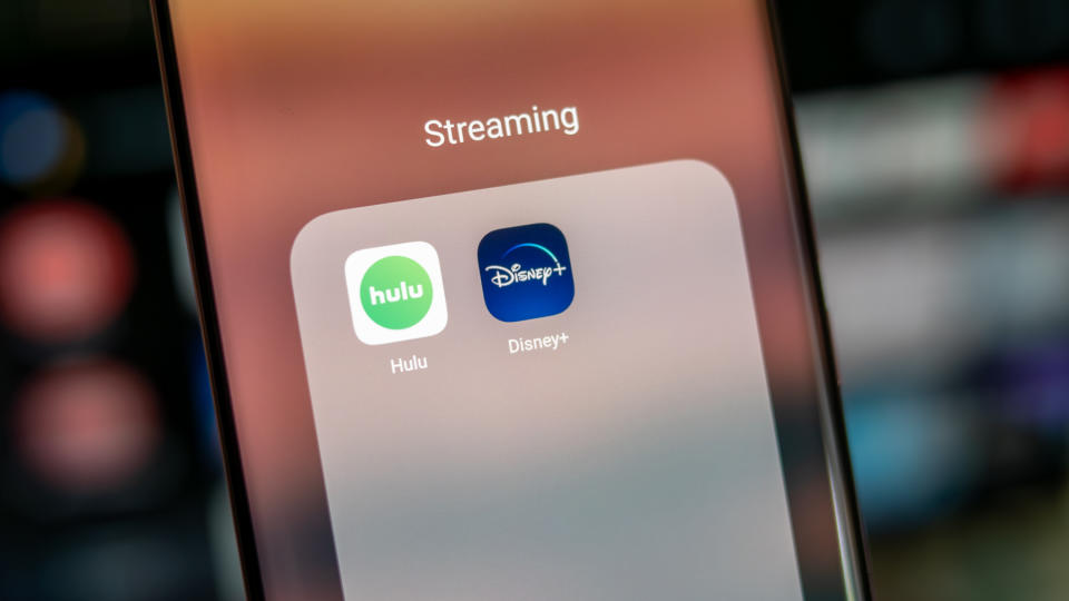 Disney Plus and Hulu icons side by side on a phone screen