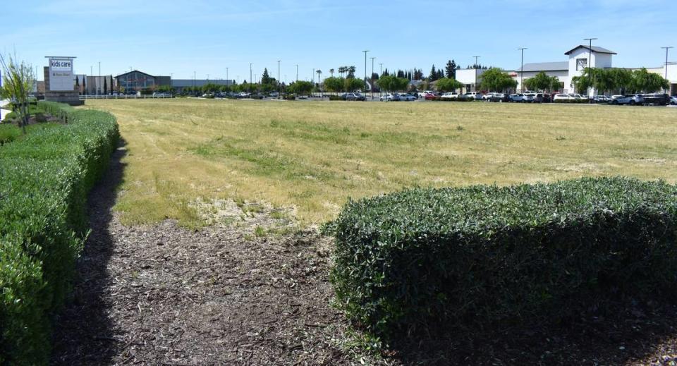 This undeveloped portion of The Marketplace in north Modesto is viewed from Oakdale Road and Sylvan Avenue, looking toward the Save Mart that anchors the shopping center, on Wednesday, April 10, 2024.