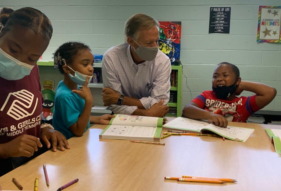 Former Tennessee Gov. Bill Haslam visits with children at a summer learning program at the Cleveland Park Boys and Girls Club on Thursday, July 15, 2021. Since he left office, Haslam and his wife, Crissy Haslam, have launched several education-related initiatives including the Tennessee Tutoring Corps and the Better Student Outcomes Now initative.