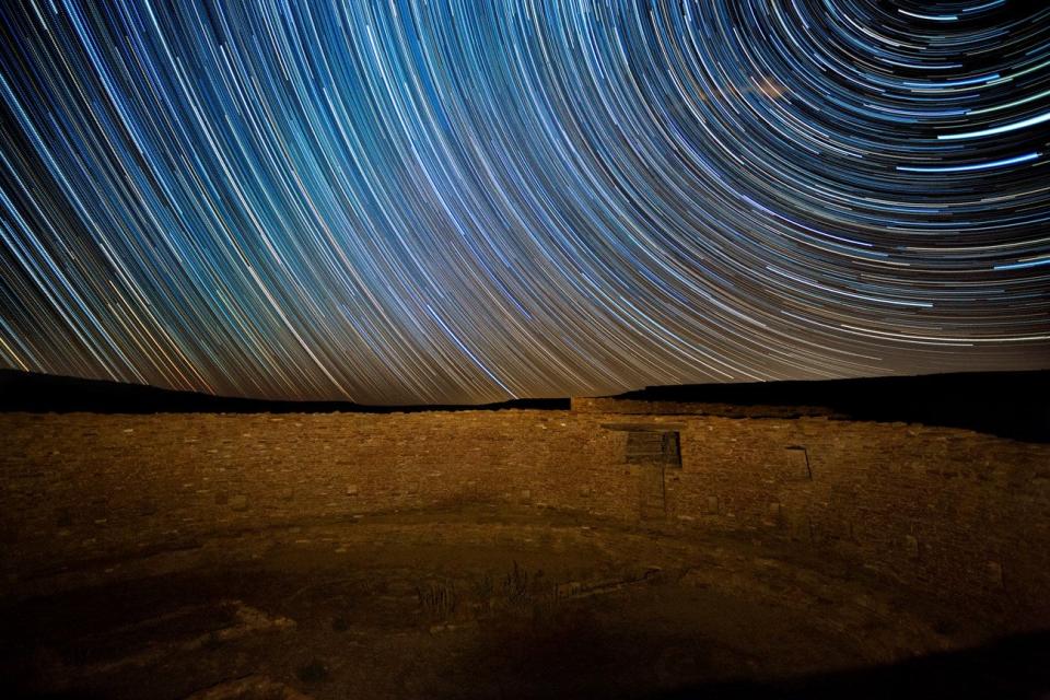 Star trails above a stone structure, Casa Rinconada, Chaco Culture National Historical Park.