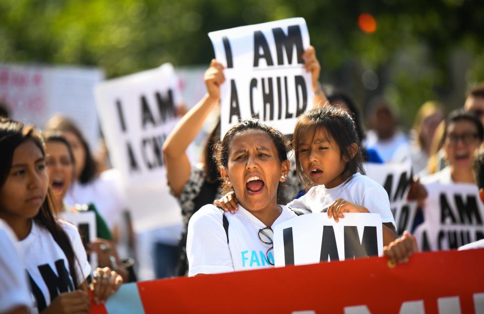 Families with young children protest the separation of immigrant families with a march and sit-in at the Hart Senate Office Building, Thursday, July 26, 2018, on Capitol Hill in Washington. The Trump administration faces a court-imposed deadline Thursday to reunite thousands of children and parents who were forcibly separated at the U.S.-Mexico border. 