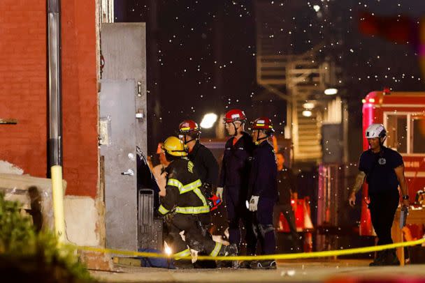 PHOTO: Emergency crews work the scene of a partial building collapse on the 300 block of Main Street, on May 28, 2023, in Davenport, Iowa. (Nikos Frazier/Quad City Times via AP)
