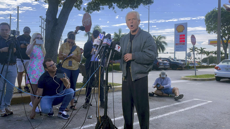 Former Trump White House official Peter Navarro speaks to reporters before he heads to prison, Tuesday, March 19, 2024 in Miami, to begin serving his sentence for refusing to cooperate with a congressional investigation into the Jan. 6, 2021, attack on the U.S. Capitol. (AP Photos/Adriana Gomez Licon)