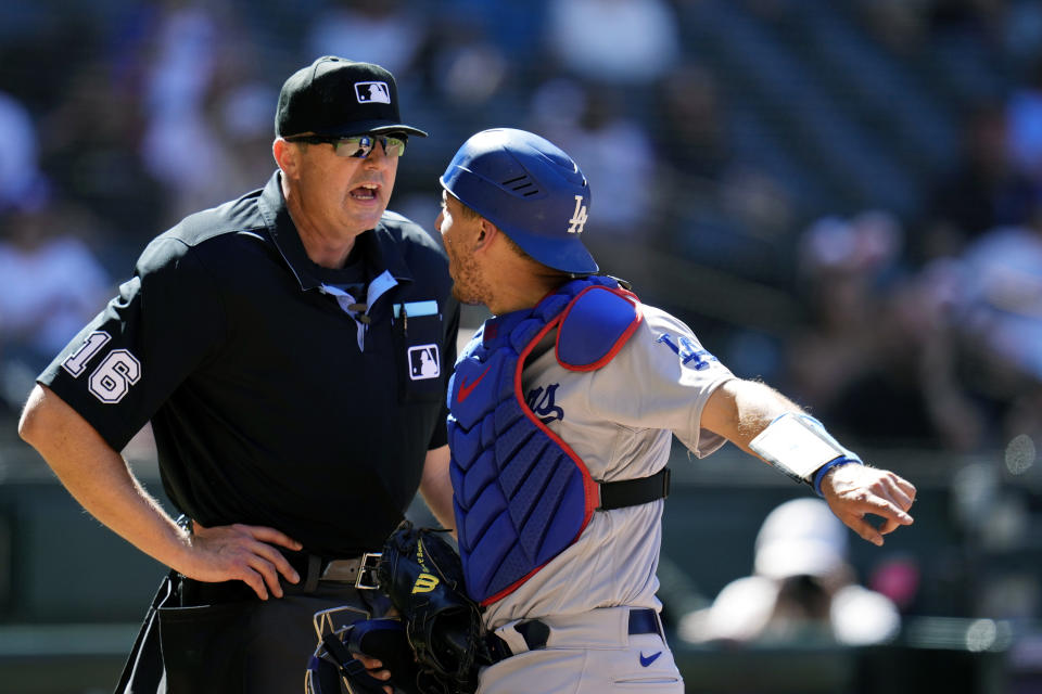 Los Angeles Dodgers' Austin Barnes, right, and umpire Lance Barrett (16) yell at each other after Barnes was ejected for arguing balls and strikes during the fifth inning of a baseball game against the Arizona Diamondbacks Sunday, April 9, 2023, in Phoenix. (AP Photo/Ross D. Franklin)