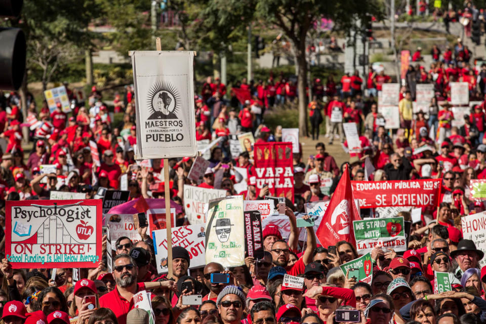 <div class="inline-image__caption"><p>Educators, parents, students, and supporters of the Los Angeles teachers strike wave and cheer in Grand Park on January 22, 2019 in downtown Los Angeles, California.</p></div> <div class="inline-image__credit">Scott Heins/Getty Images</div>