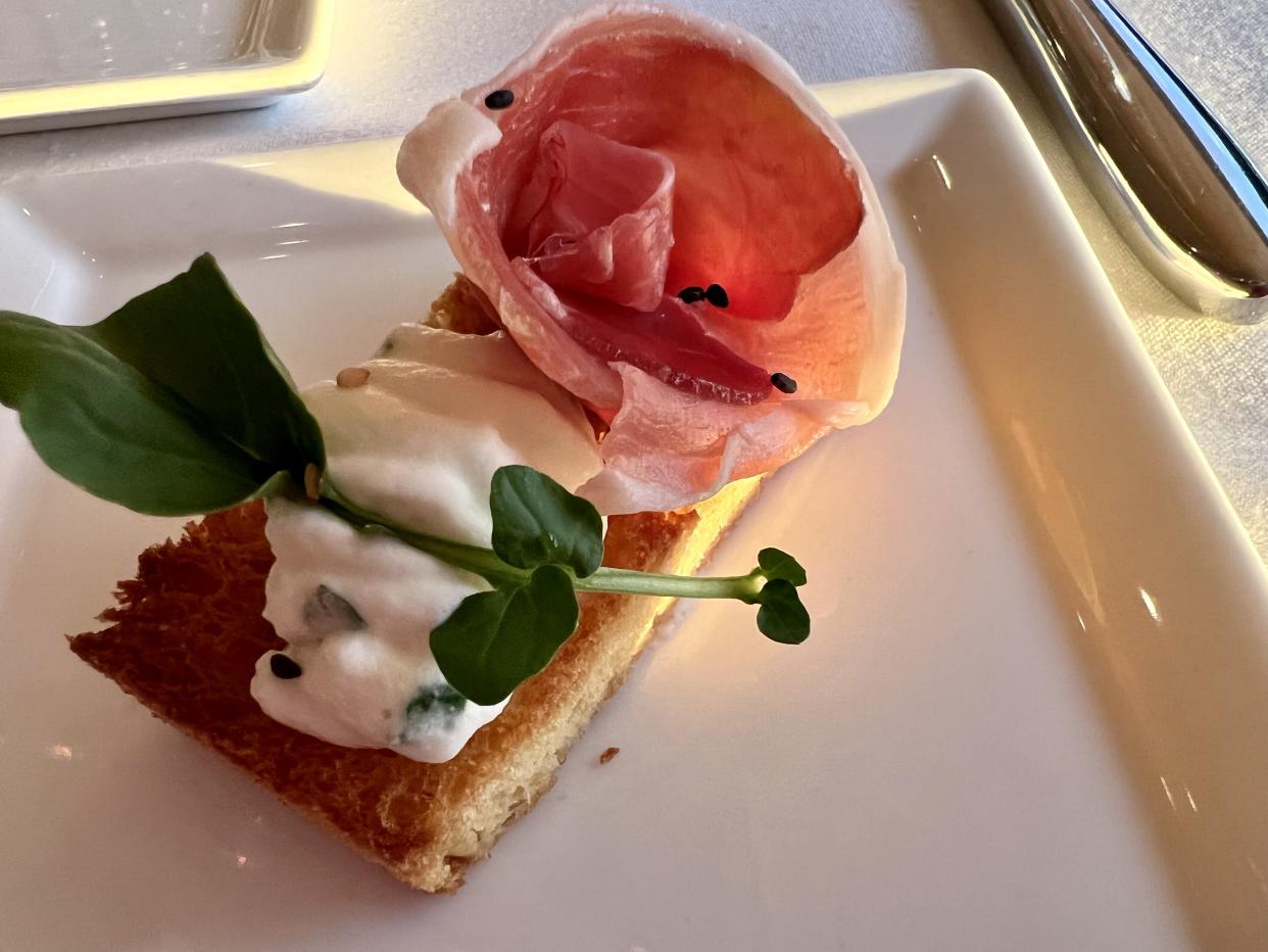 Our dining experience at California Grill started with an amuse-bouche: prosciutto and herbed cheese on toasted bread. (Photo: Terri Peters)