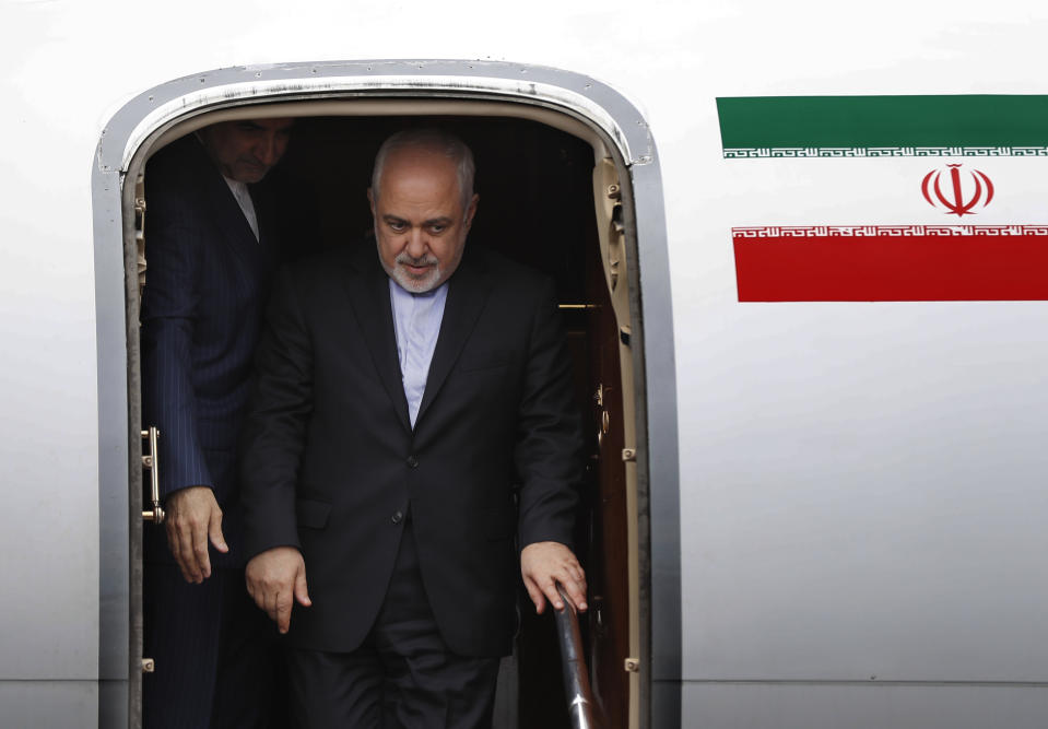 Iran's Foreign Minister Mohammad Javad Zarif arrives at Rafik Hariri Airport, in Beirut, Lebanon, Sunday, Feb. 10, 2019. Zarif said Sunday that his country is ready to cooperate with the new Lebanese government, offering his country's support in all sectors. (AP Photo/Hussein Malla)