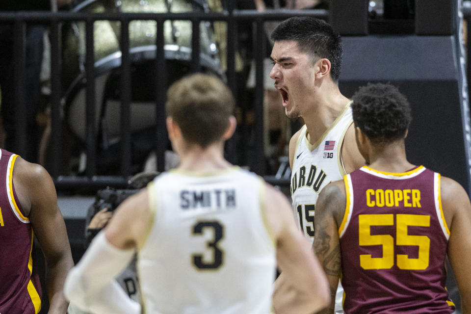 Purdue center Zach Edey (15) reacts after scoring during the first half of an NCAA college basketball game against Minnesota, Sunday, Dec. 4, 2022, in West Lafayette, Ind. (AP Photo/Doug McSchooler)