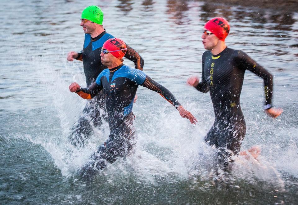 Hundreds of athletes compete in IRONMAN Indiana and IRONMAN 70.3 Muncie at Prairie Creek Reservoir Saturday, Oct. 2, 2021. 