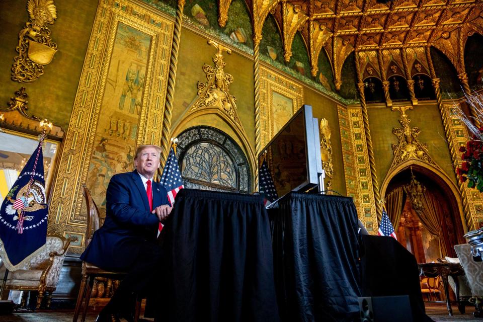 President Donald Trump speaks to the media after making a Christmas eve video conference call to members of the armed forces from Mar-a-Lago in Palm Beach, FL on Tuesday December 24, 2019. [RICHARD GRAULICH/palmbeachpost.com]