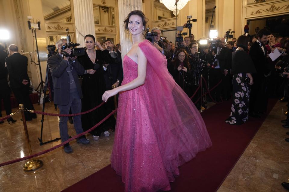 Dancer Anna Olkhovaya arrives to attend La Scala opera house's gala season opener, Giuseppe Verdi's opera 'Don Carlo' at the Milan La Scala theater, Italy, Thursday Dec. 7, 2023. The season-opener Thursday, held each year on the Milan feast day St. Ambrose, is considered one of the highlights of the European cultural calendar. (AP Photo/Luca Bruno)