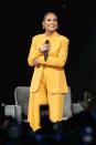 <p>She radiated in a vibrant yellow suit for an appearance on Oprah Winfrey's 2020 Vision tour.</p>