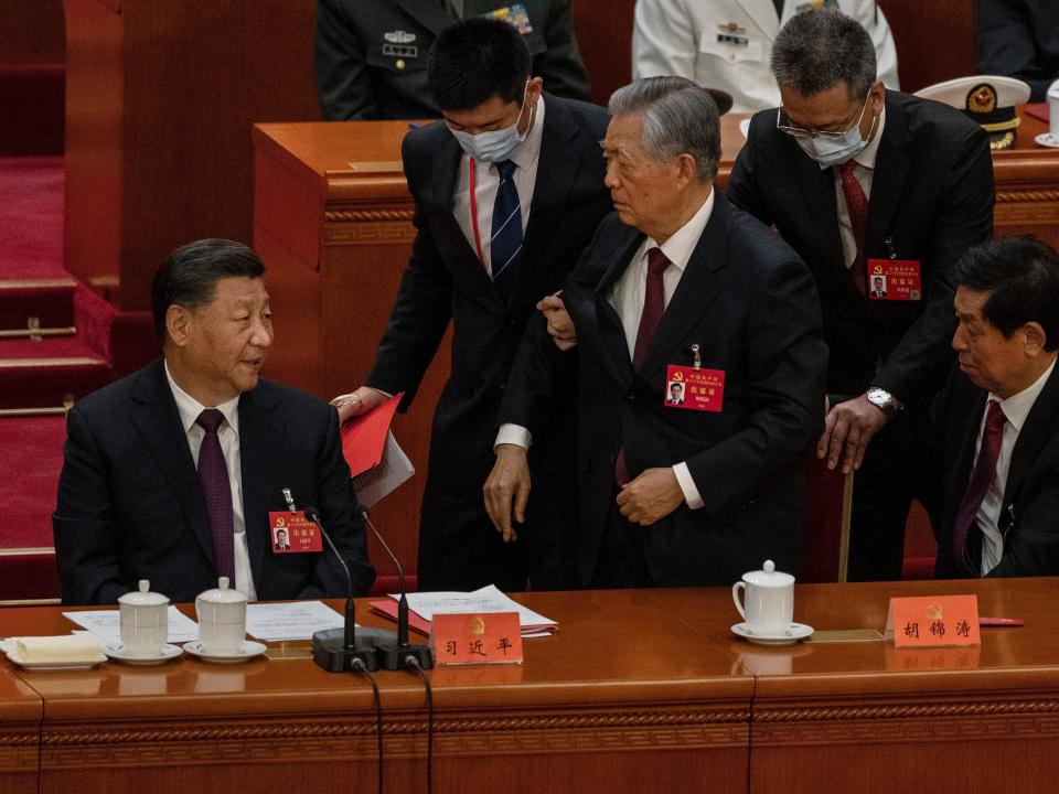 President Hu Jintao escorted out of China Party Congress