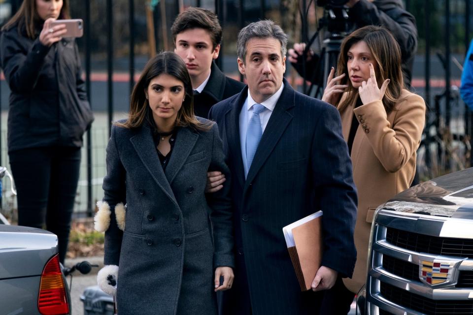 Michael Cohen arrive at federal court with his children, Samantha and Jake, and wife Laura Shusterman (AP)