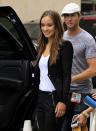 Actress Olivia Wilde and her husband Tao Ruspoli leave a hotel in San Diego
