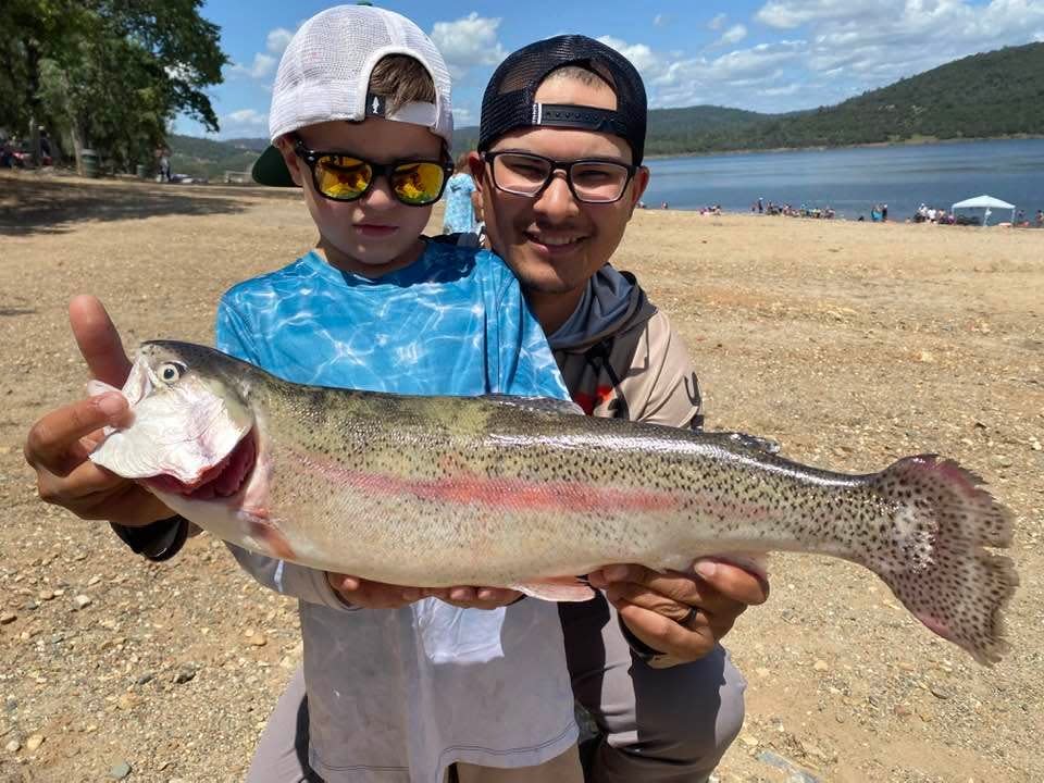 Liam Owens won first place in the youth division of the tournament at Collins Lake with his 4.61-pound rainbow caught while fishing with his dad, Eric Owens.