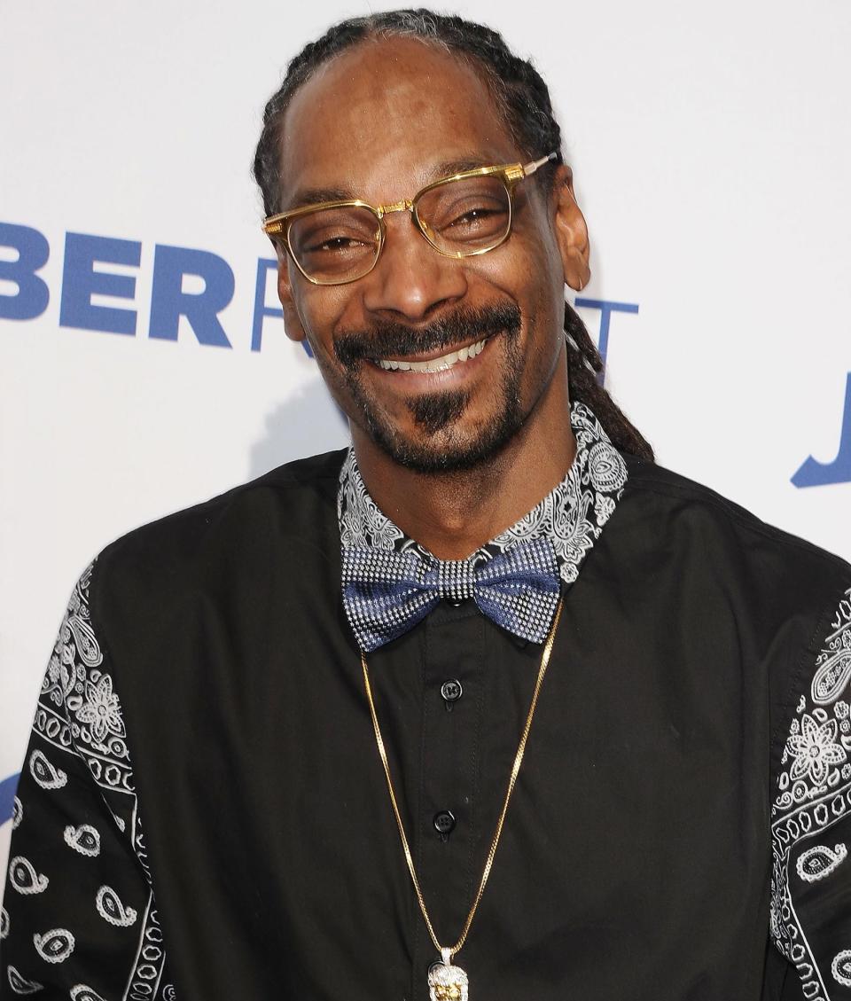 <p>The rapper announced that he would be <a href="https://people.com/music/snoop-dogg-to-vote-for-first-time-2020/" rel="nofollow noopener" target="_blank" data-ylk="slk:voting for the first time ever;elm:context_link;itc:0;sec:content-canvas" class="link ">voting for the first time ever </a>on the Real 92.3 radio show, <a href="https://www.youtube.com/watch?time_continue=716&v=pv_bKjhk7k4&feature=emb_logo" rel="nofollow noopener" target="_blank" data-ylk="slk:Big Boy's Neighborhood;elm:context_link;itc:0;sec:content-canvas" class="link "><em>Big Boy's Neighborhood</em></a>. Snoop said he was under the impression that he wasn't allowed to vote after being convicted of felonies in 1990 and 2007.</p> <p>"For many years they had me brainwashed thinking that you couldn’t vote because you had a criminal record," the star said. "I didn't know that. My record's been expunged so now I can vote."</p> <p>Snoop has also partnered with the Democratic National Committee to launch a new ad, "<a href="https://protect-us.mimecast.com/s/CEa3CERyRWsWoWN7PtN8glE?domain=youtube.com" rel="nofollow noopener" target="_blank" data-ylk="slk:Drop It In The Box!;elm:context_link;itc:0;sec:content-canvas" class="link ">Drop It In The Box!</a>" Featuring his hit song “Drop It Like It’s Hot,” the ad highlights how voters can drop their ballot in a convenient drop box location. </p> <p>"This is the most important election of our lifetimes and it's my first time voting. We need every single American to get out there and vote,” he said. “It's time for y'al to drop those ballots like they're hot — in your local drop box. Vote early and let ‘em know our voices will be heard!"</p> <p>The spot directs voters to <a href="https://protect-us.mimecast.com/s/GojFCJ616Wh8L8DJXCzssx2?domain=iwillvote.com/" rel="nofollow noopener" target="_blank" data-ylk="slk:IWillVote.com;elm:context_link;itc:0;sec:content-canvas" class="link ">IWillVote.com</a> to learn about drop box locations in their state and any other information they may need to make their plan to vote. </p>