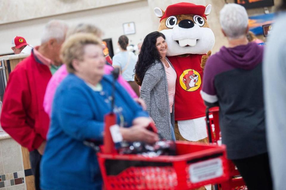 A customer takes photo with the Buc-ee’s beaver mascot during the grand opening of Buc-ee’s in Tennessee on June 26.