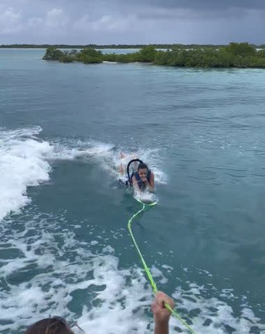 <p>Kim Kardashian/Instagram</p> Kim Kardashian posted videos on her Instagram Story Tuesday that showed her falling off a wakeboard during a water sports session