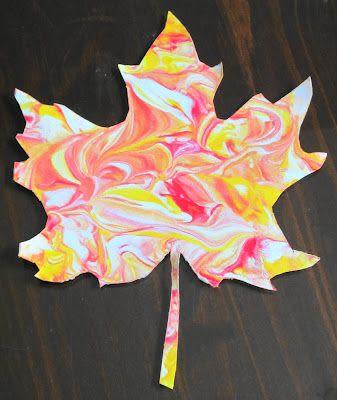 paper cut out leaf with tie dye coloring