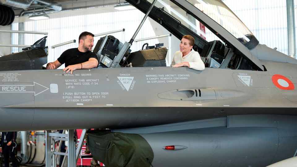 Ukrainian President Volodymyr Zelenskiy and Denmark's Prime Minister Mette Frederiksen pictured sitting in an F-16. - Mads Claus Rasmussen/Ritzau Scanpix/Reuters