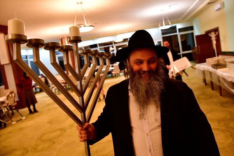 Hasidic Jewish refugees from Ukraine celebrate Hanukkah at a kosher shelter on the banks of Hungary's Lake Balaton