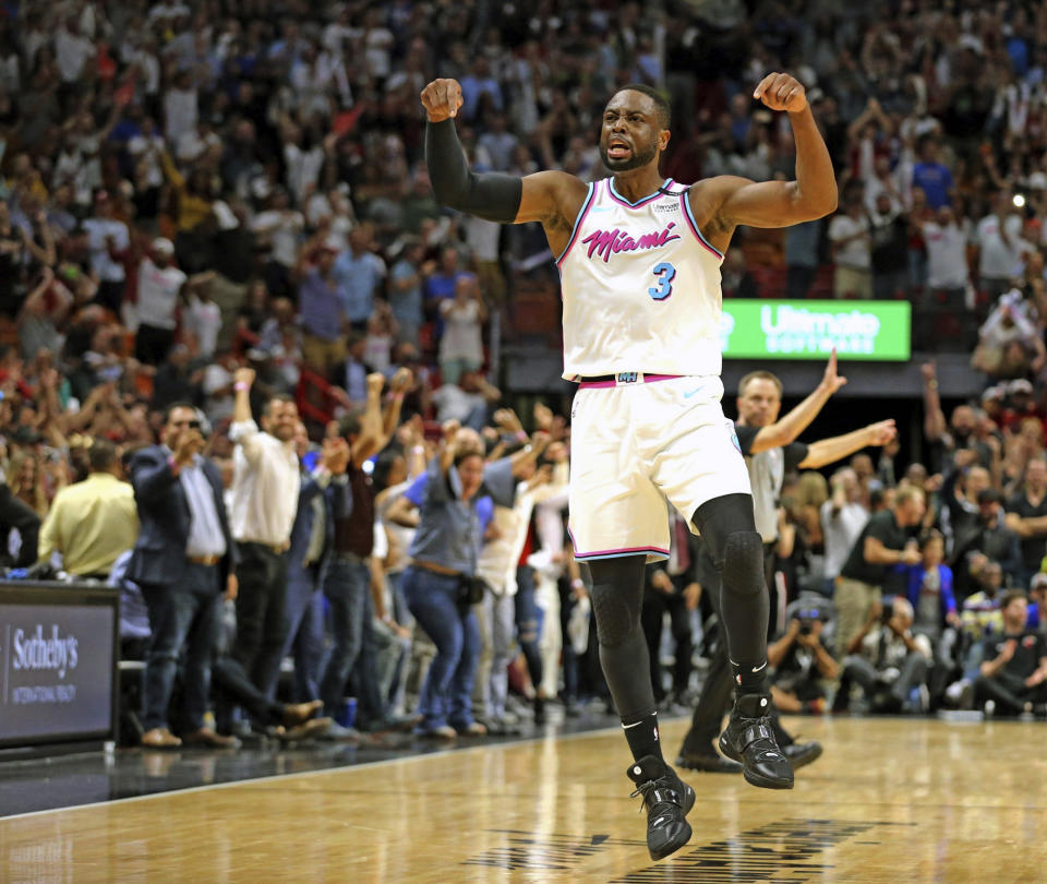 Dwyane Wade reminds everyone whose house AmericanAirlines Arena is. (AP)