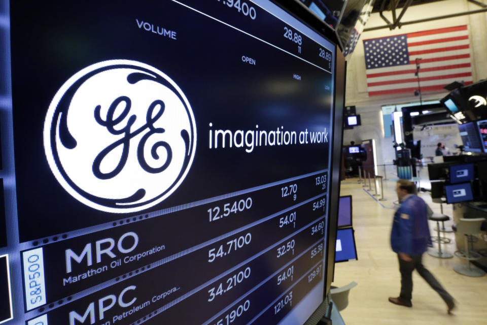 The GE logo appears above a trading post on the floor of the New York Stock Exchange in 2017. (AP Photo/Richard Drew)