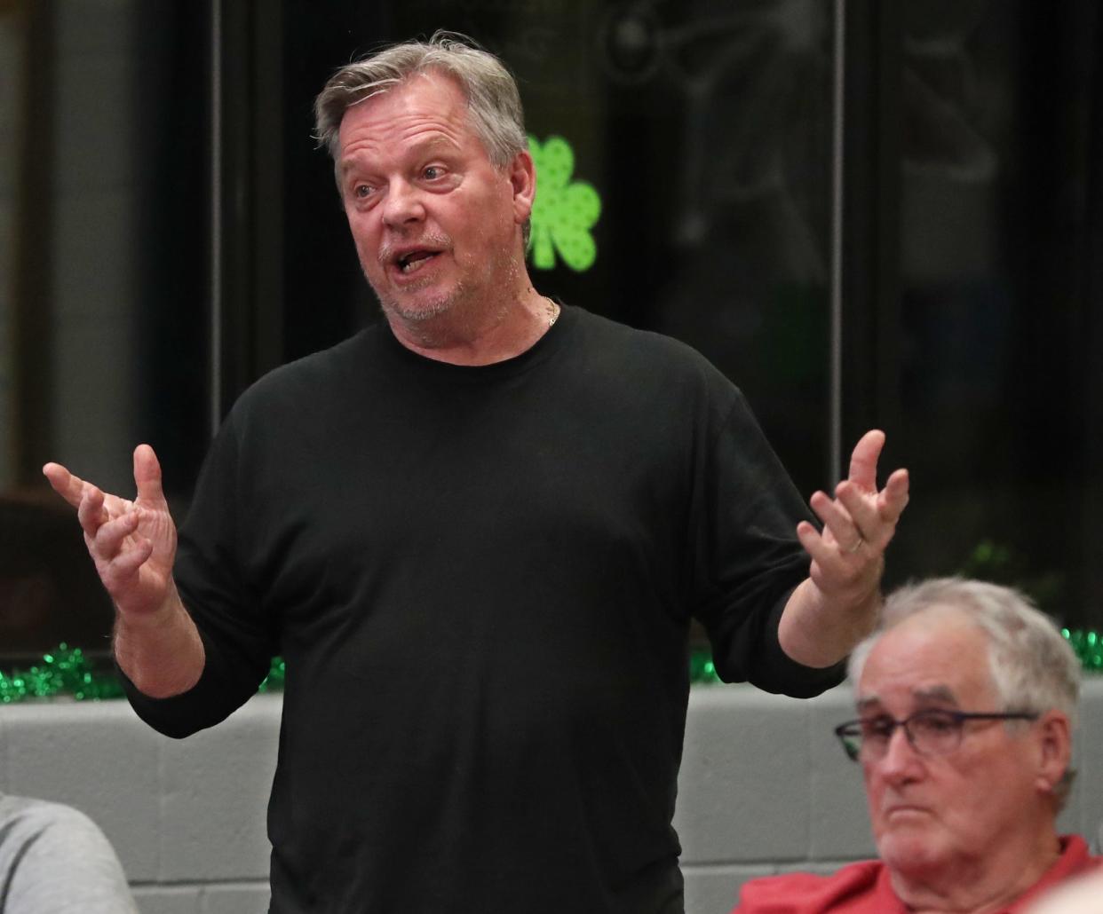 Rick Laney asks a question Tuesday during the Ward 9 monthly meeting at the Kenmore Community Center.
