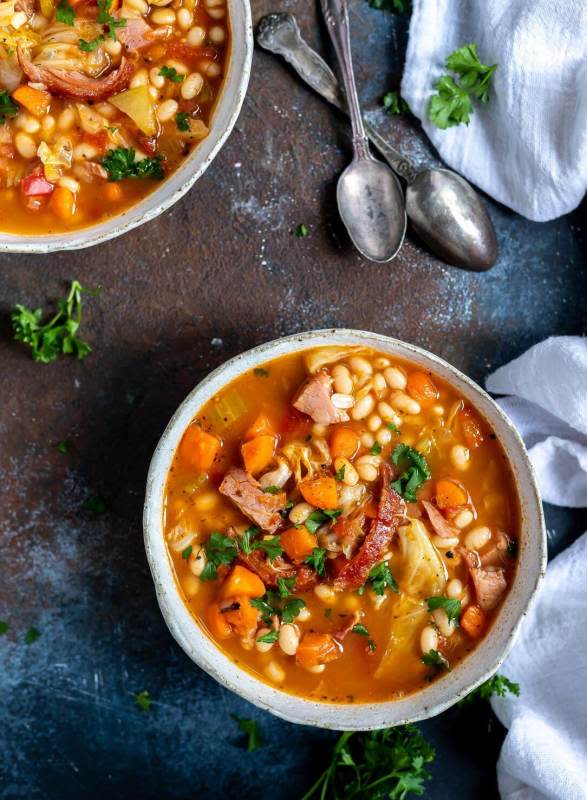 <p>Wonky Wonderful</p><p>Make this ham and bean soup to use your ham leftovers in an entirely new dinner. This easy, healthy meal is perfect for a cold winter day. </p><p><strong>Get the recipe: <a href="https://wonkywonderful.com/ham-and-bean-soup-recipe/" rel="nofollow noopener" target="_blank" data-ylk="slk:Leftover Ham and Bean Soup;elm:context_link;itc:0;sec:content-canvas" class="link rapid-noclick-resp">Leftover Ham and Bean Soup</a></strong></p>