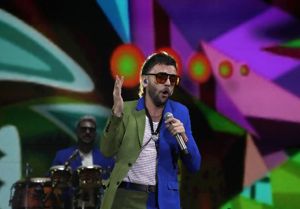 Los Caligaris durante su presentación en el festival Vive Latino en la Ciudad de México el sábado 18 de marzo de 2023. (Foto AP/Fernando Llano)