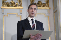 Permanent Secretary of the Swedish Academy Mats Malm announces the 2022 Nobel Prize in Literature, in Borshuset, Stockholm, Sweden, Thursday, Oct. 6, 2022. The 2022 Nobel Prize in literature was awarded to French author Annie Ernaux, for “the courage and clinical acuity with which she uncovers the roots, estrangements and collective restraints of personal memory,” the Nobel committee said. (Henrik Montgomery/TT News Agency via AP)