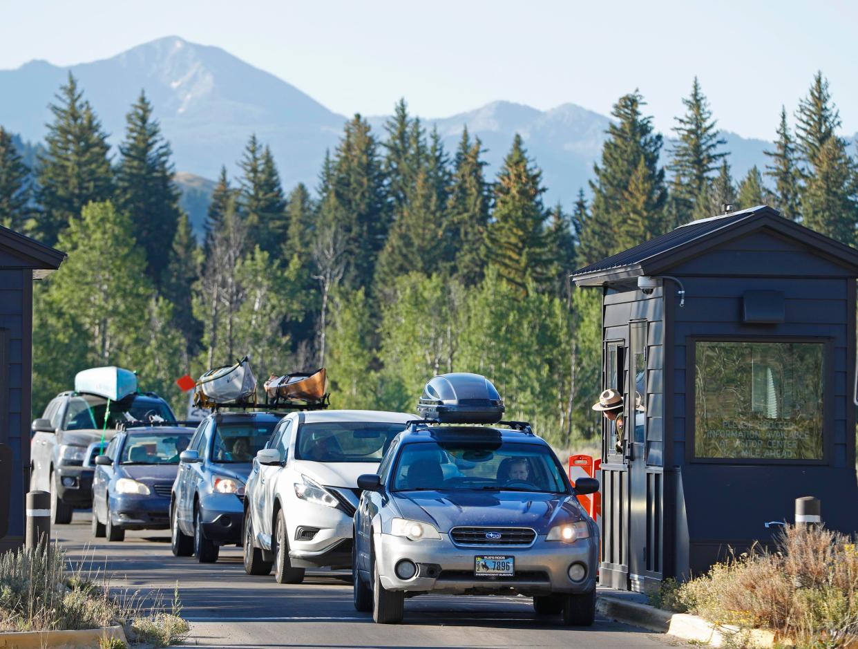 Cars line up at the south entrance to Grand Teton National Park on August 19, 2017 outside Jackson, Wyoming. People flocked to the Jackson and Teton National Park area for the 2017 solar eclipse.