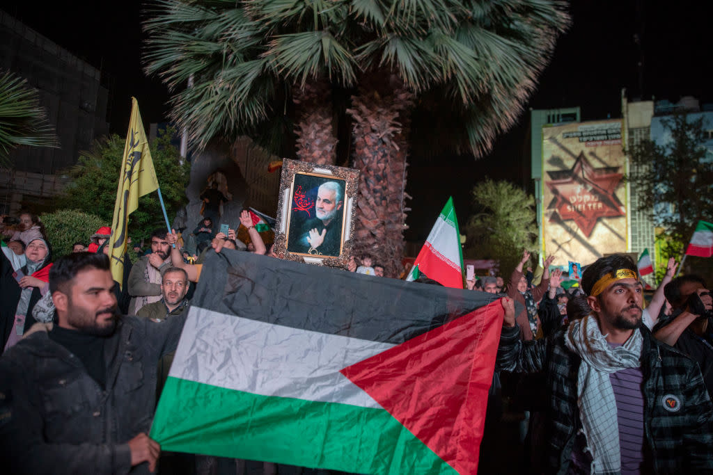 People gather in Tehran, Iran, on April 14, 2024, in support of the Islamic Revolutionary Guard Corps' attack on Israel. (Photo by Majid Saeedi/Getty Images)