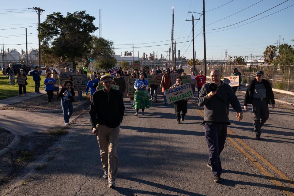 From front left, Rev. Henry Williams and Lamont Taylor lead a march from the site of the Inner Harbor desalination plant, located in the Hillcrest neighborhood, to the Brooks AME Worship Center on Thursday, Dec. 28, 2023, in Corpus Christi, Texas. More than 40 people marched along Broadway Street to protest the plant.