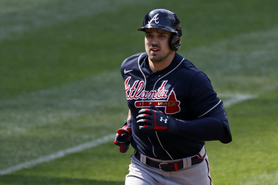 Atlanta Braves' Adam Duvall rounds the bases after hitting a solo home run against the New York Mets during the second inning of a baseball game Saturday, July 25, 2020, in New York. (AP Photo/Adam Hunger)