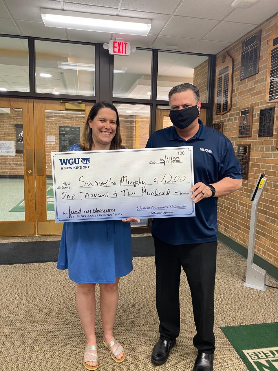 Samantha Murphy, a tenth-grade English teacher at Lincoln Community High School, received a $1,200 grant from Dan Winkler with Western Governors University to help buy additional books for her classroom.
