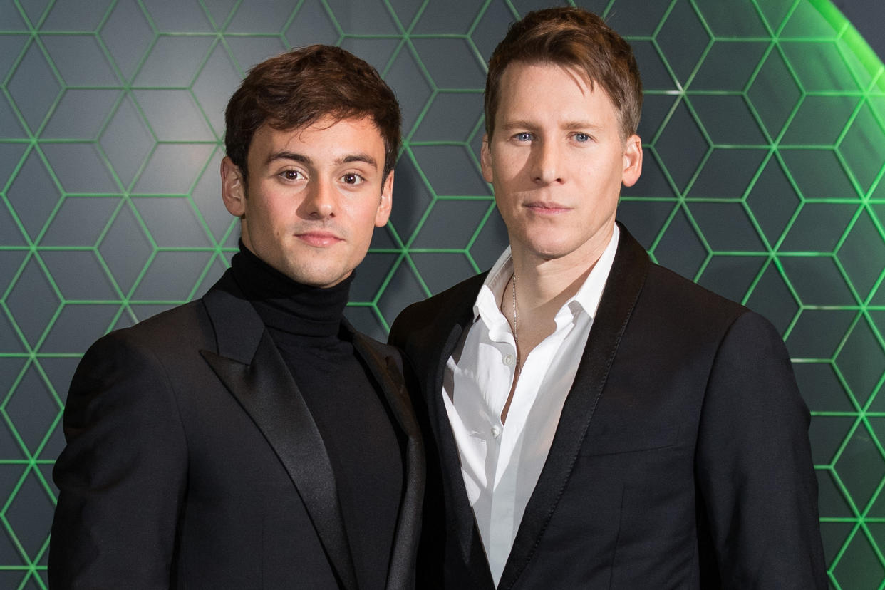 Image: Tom Daley and Dustin Lance Black at the Vanity Fair x Bloomberg climate change gala dinner in London on Dec. 11, 2018. (Jeff Spicer / Getty Images file)