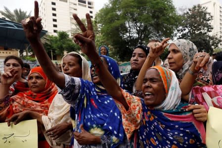 Supporters of political party Pakistan People's Party (PPP) chant slogans during a protest in Karachi