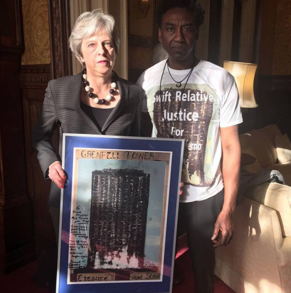 Theresa May was given a painting by artist Damel Carayol following the meeting (Facebook)