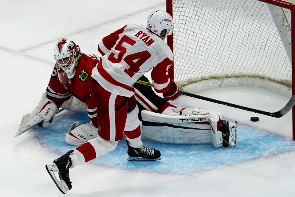 Detroit Red Wings' (54) Bobby Ryan scores against Chicago Blackhawks goaltender Kevin Lankinen in a shootout of an NHL preseason hockey game in Chicago, Wednesday, Sept. 29, 2021. The Red Wings won 4-3.