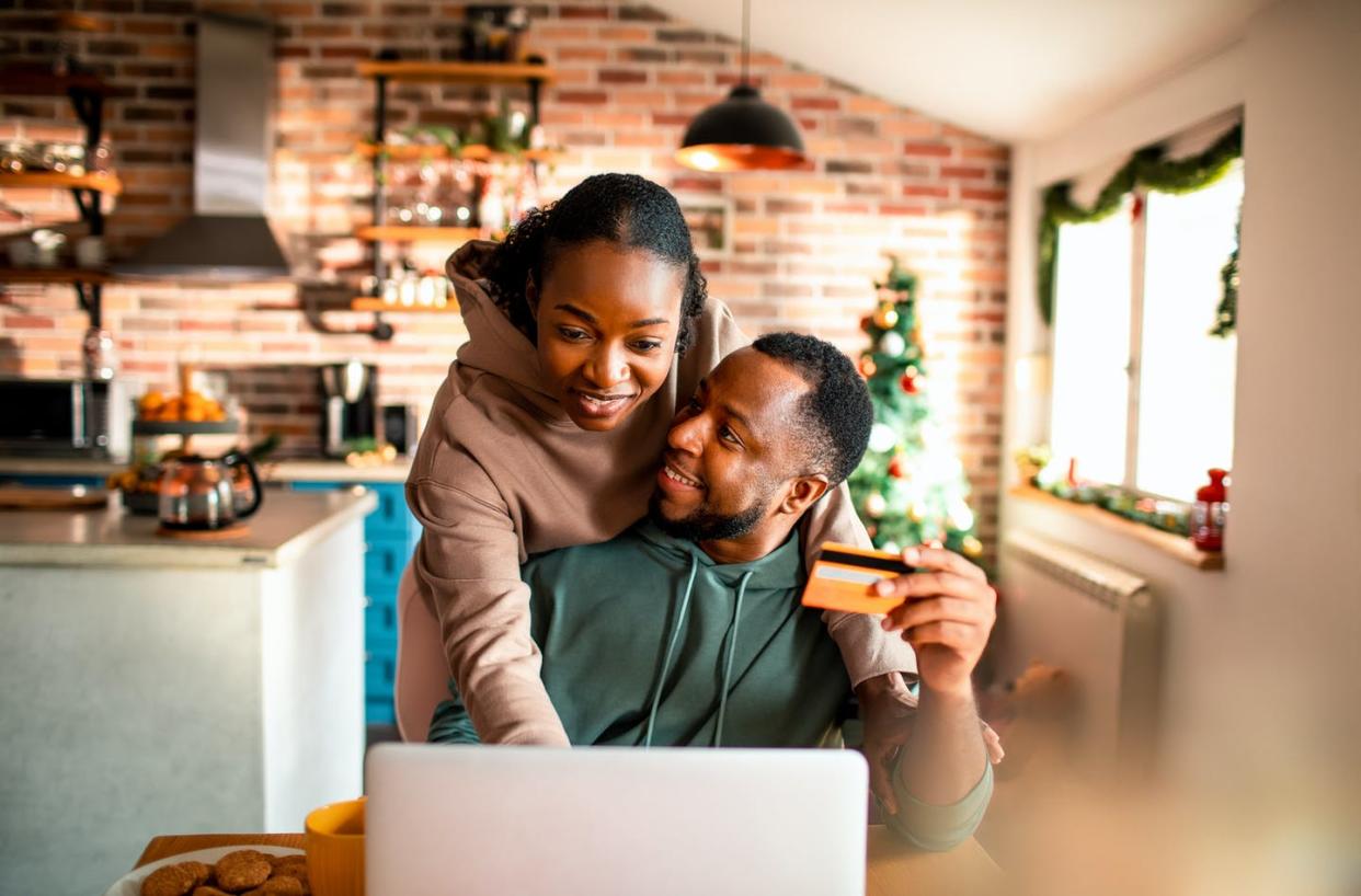 <span class="caption">Negotiation concepts can be used not only to get what you need or want but also to make your family life happier overall.</span> <span class="attribution"><a class="link " href="https://www.gettyimages.com/detail/photo/young-couple-doing-online-christmas-shopping-royalty-free-image/1283427204" rel="nofollow noopener" target="_blank" data-ylk="slk:Marko Geber/DigitalVision via Getty Images;elm:context_link;itc:0;sec:content-canvas">Marko Geber/DigitalVision via Getty Images</a></span>