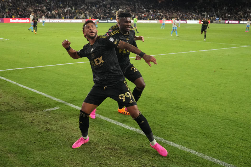 May 2, 2023; Los Angeles, CA, USA; LAFC forward Denis Bouanga (99) celebrates with midfielder Jose Cifuentes (20) and forward Stipe Biuk (7) after scoring a goal against the Philadelphia Union in the second half at BMO Stadium. Mandatory Credit: Kirby Lee-USA TODAY Sports