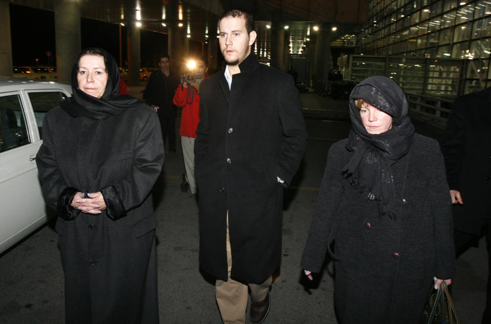 FILE -- In this Dec. 18, 2007, file photo, Christine Levinson, left, the wife of a missing American former FBI agent, her son, Daniel, and her sister Susan exit Tehran's Imam Khomeini airport upon their arrival in Iran. The family of Robert Levinson, who went missing in Iran a decade ago on an unauthorized CIA assignment, filed a lawsuit Tuesday, March 21, 2017, against Iran. The lawsuit in U.S. federal court describes in detail offers by Iran to “arrange” for his release in exchange for a series of concessions, including for the return of a Revolutionary Guard general who defected to the West.. (AP Photo/Vahid Salemi, File)