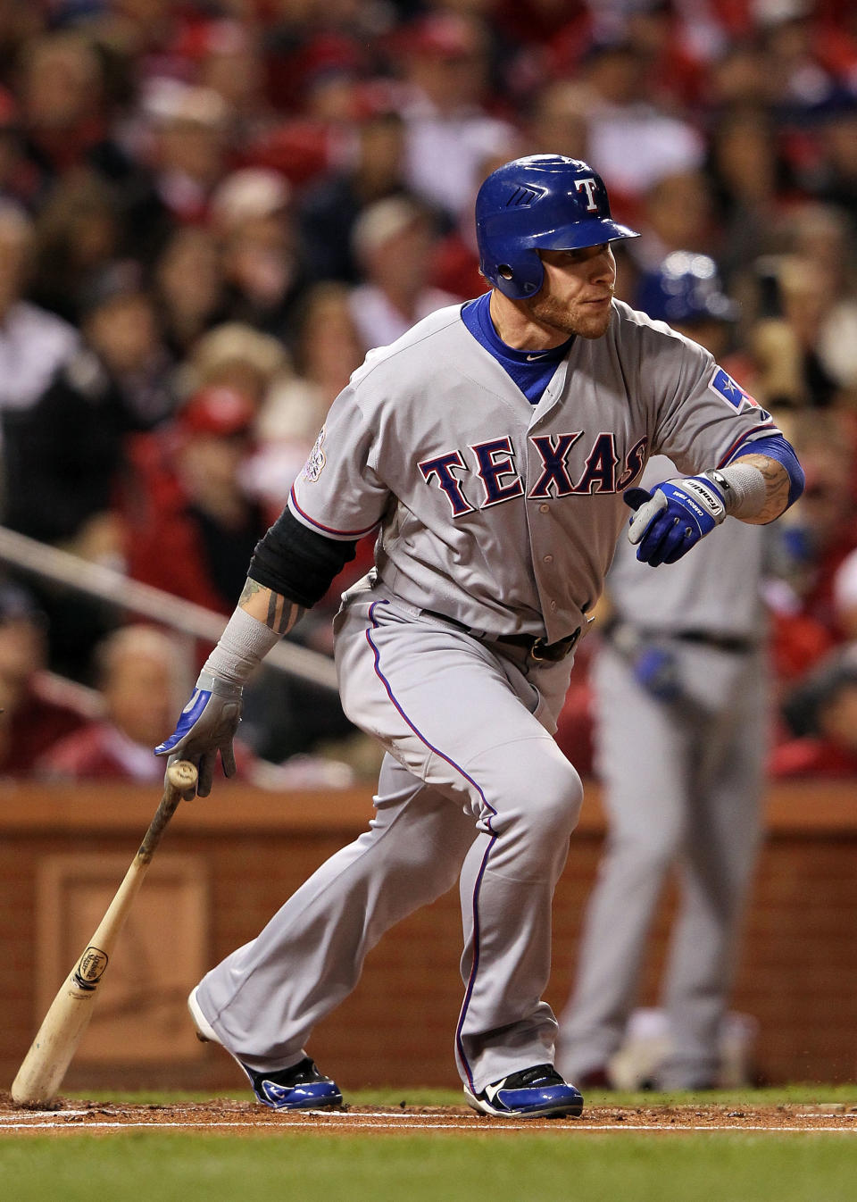 ST LOUIS, MO - OCTOBER 27: Josh Hamilton #32 of the Texas Rangers hits an RBI single to score Ian Kinsler #5 in the first inning during Game Six of the MLB World Series against the St. Louis Cardinals at Busch Stadium on October 27, 2011 in St Louis, Missouri. (Photo by Jamie Squire/Getty Images)